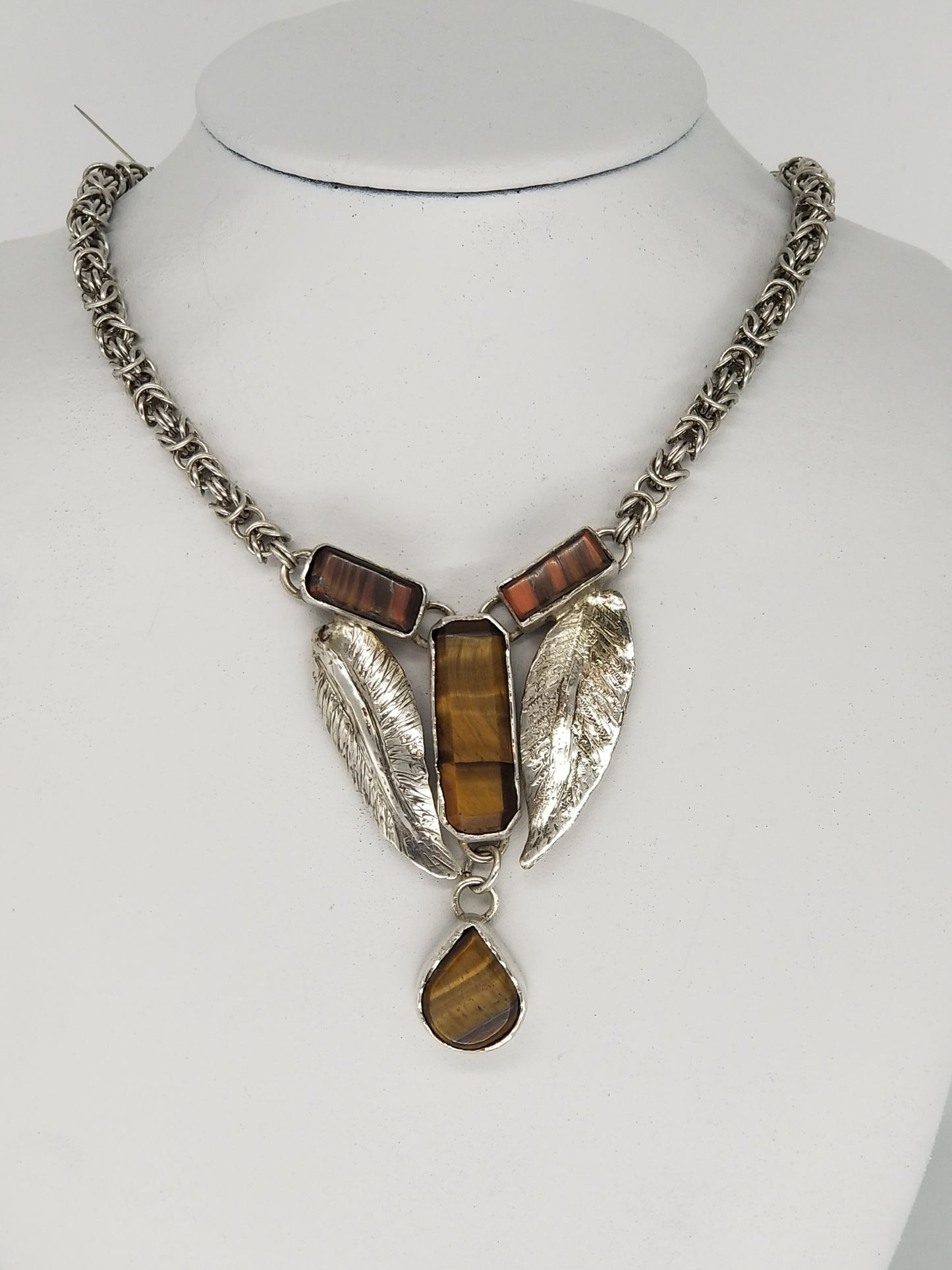 Two Feathers in Sterling