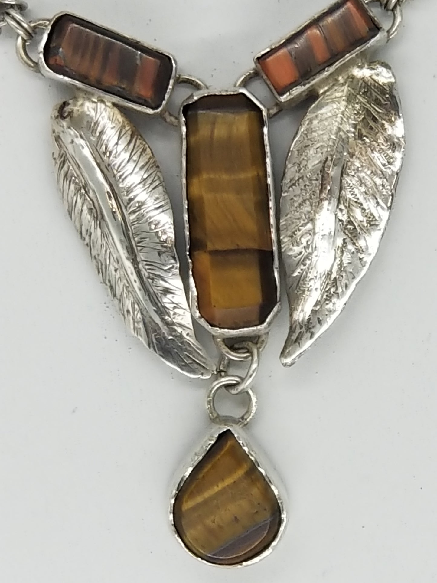 Two Feathers in Sterling